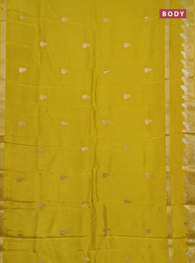 Semi mysore silk saree lime yellow with zari woven floral buttas and long rettapet zari woven border