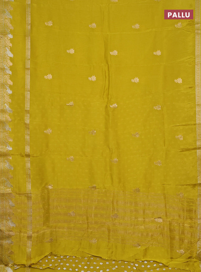 Semi mysore silk saree lime yellow with zari woven floral buttas and long rettapet zari woven border