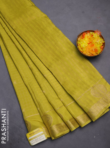 Semi mysore silk saree lime yellow with allover zari checks & buttas and zari woven butta border