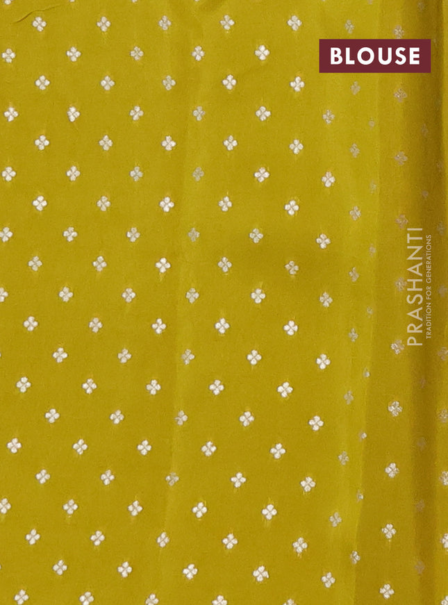 Semi mysore silk saree lime yellow with allover zari checks & buttas and zari woven butta border
