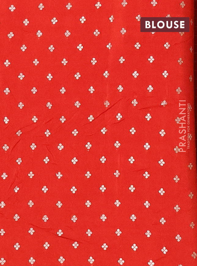 Semi mysore silk saree orange with allover zari checks & buttas and zari woven butta border