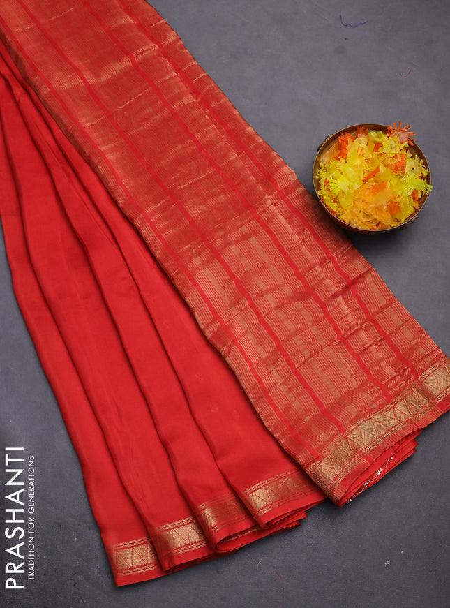 Semi mysore silk saree orange with plain body and zari woven border