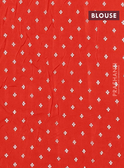 Semi mysore silk saree orange with plain body and zari woven border