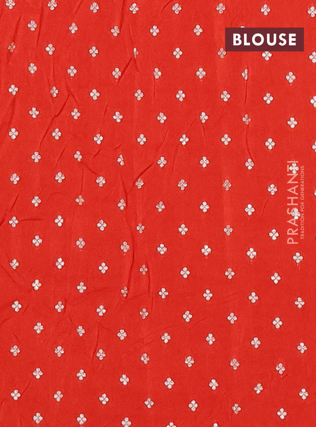 Semi mysore silk saree orange with plain body and zari woven border