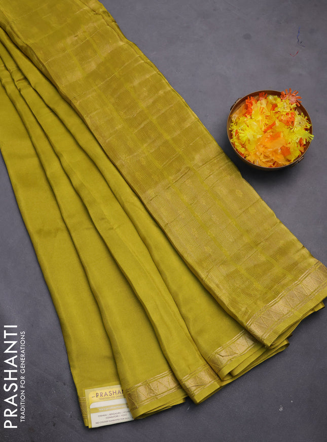 Semi mysore silk saree lime yellow with plain body and zari woven border