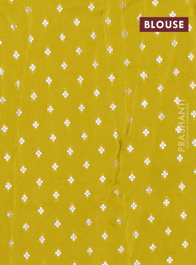 Semi mysore silk saree lime yellow with plain body and zari woven border