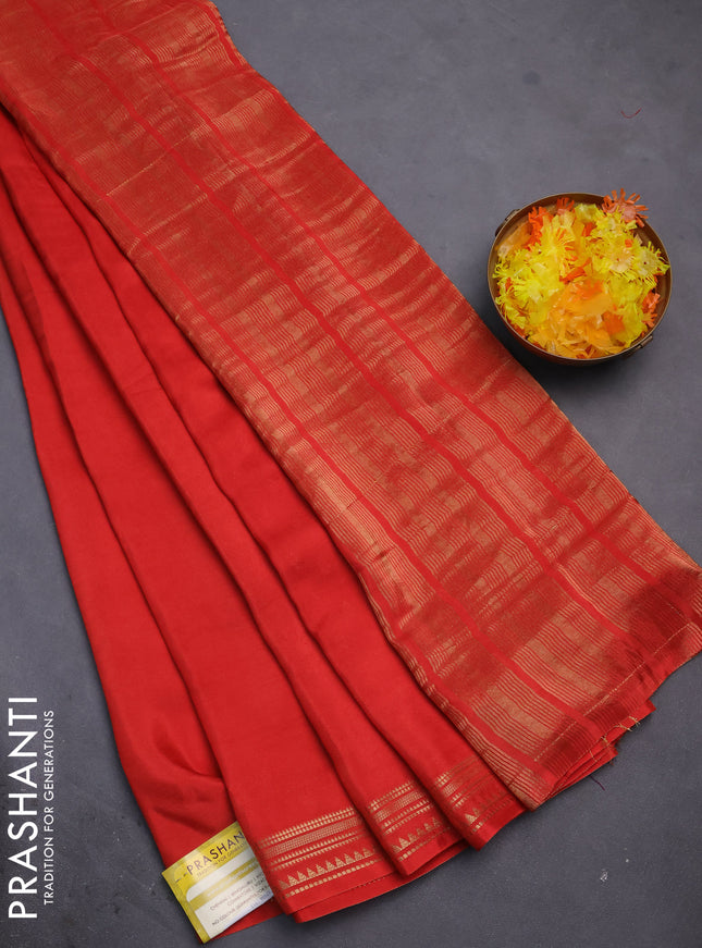Semi mysore silk saree orange with plain body and zari woven border