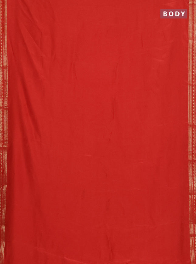 Semi mysore silk saree orange with plain body and zari woven border