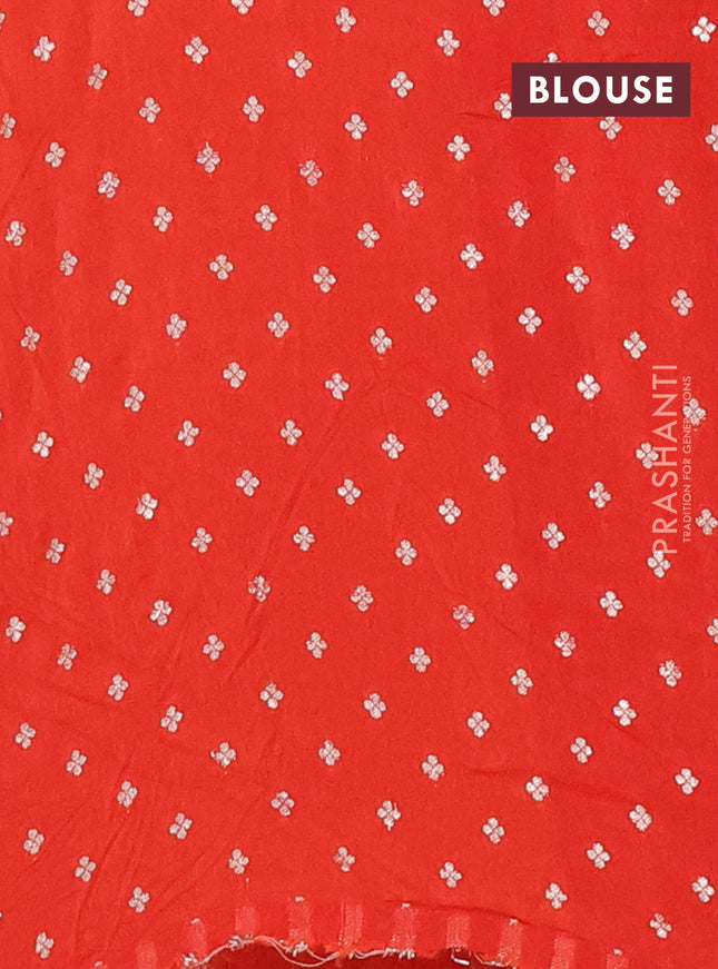 Semi mysore silk saree orange with plain body and zari woven border