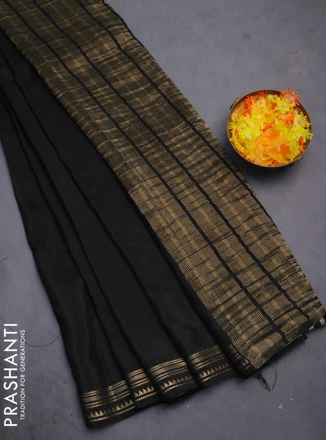 Semi mysore silk saree black with plain body and zari woven border