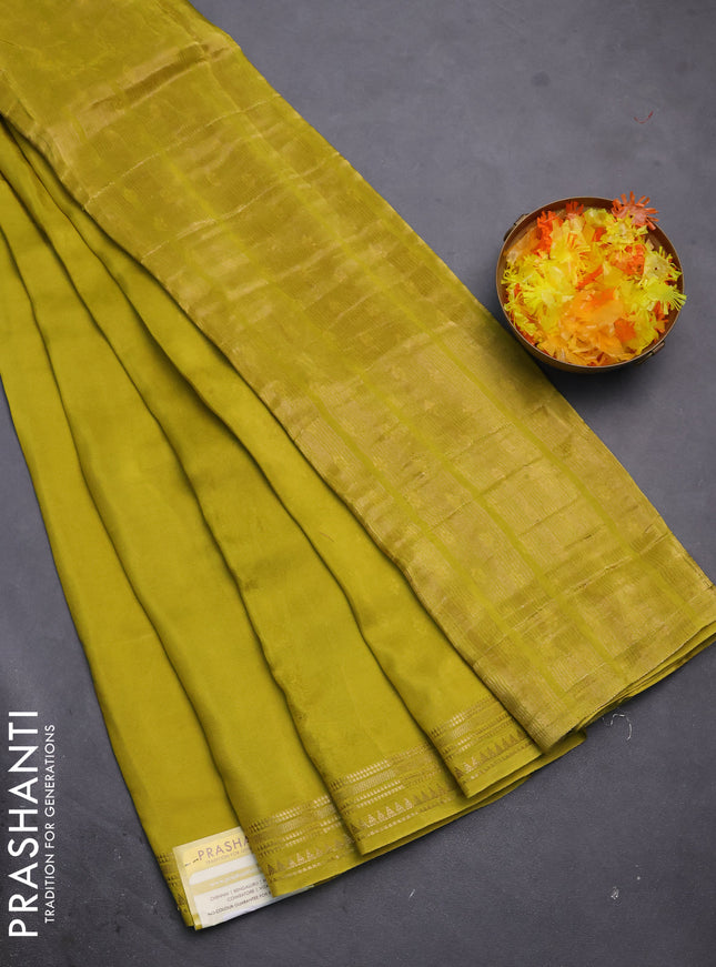 Semi mysore silk saree lime yellow with plain body and zari woven border