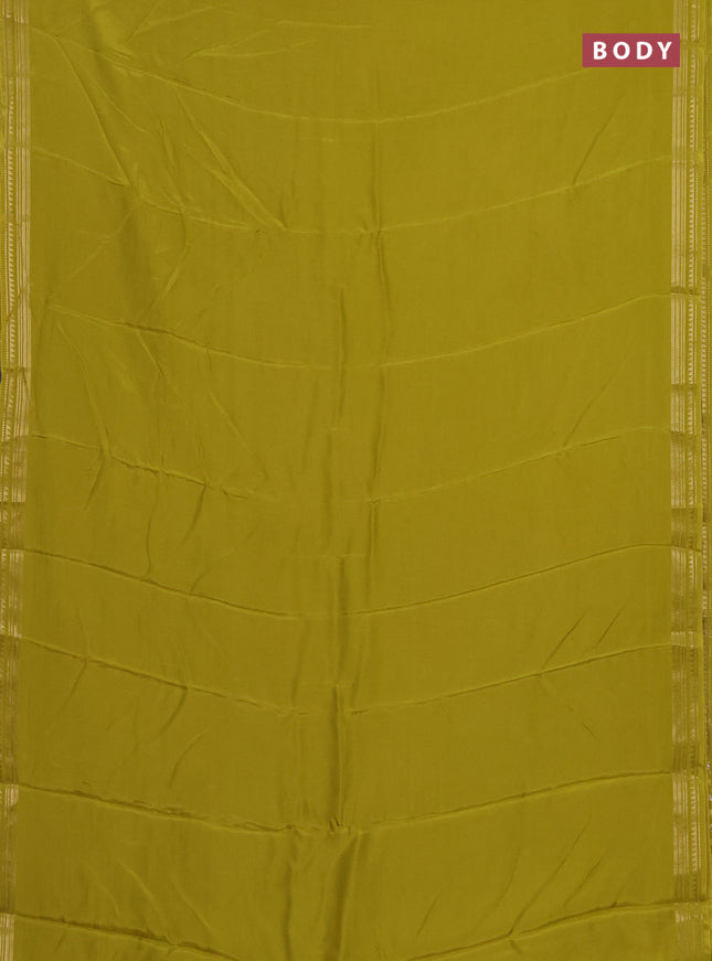 Semi mysore silk saree lime yellow with plain body and zari woven border