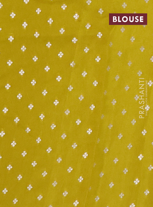 Semi mysore silk saree lime yellow with plain body and zari woven border