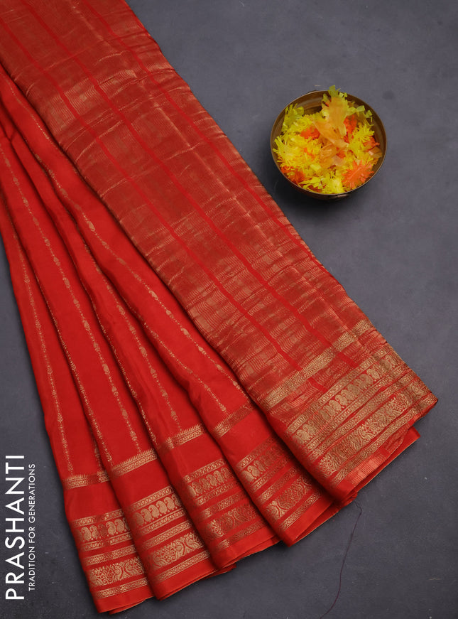 Semi mysore silk saree orange with allover zari weaves and zari woven border