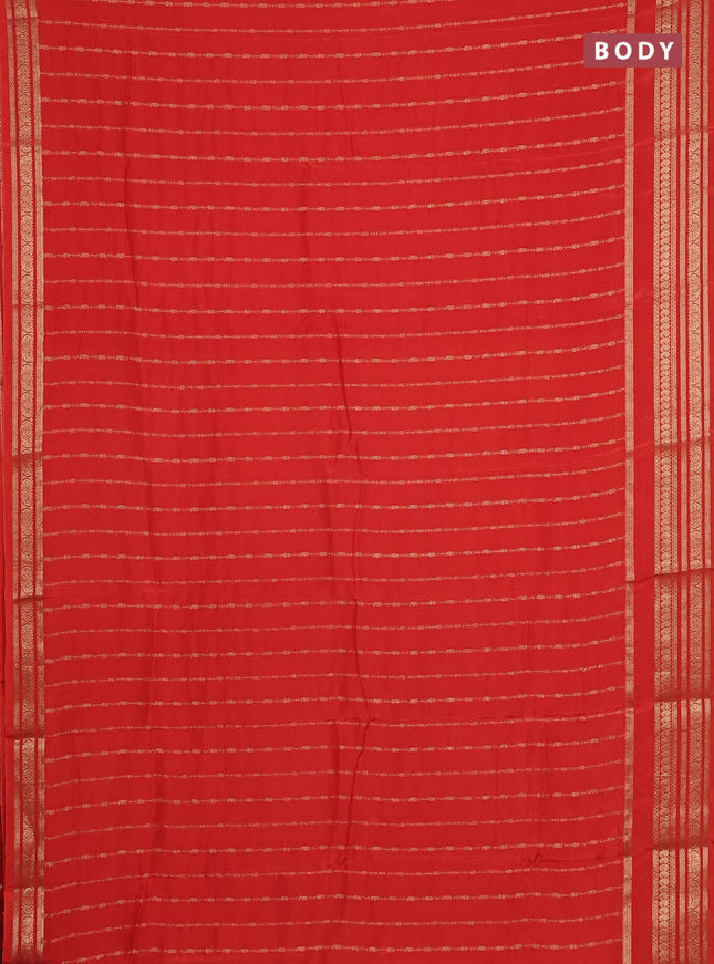 Semi mysore silk saree orange with allover zari weaves and zari woven border