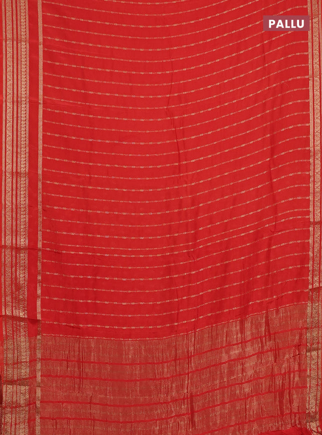 Semi mysore silk saree orange with allover zari weaves and zari woven border