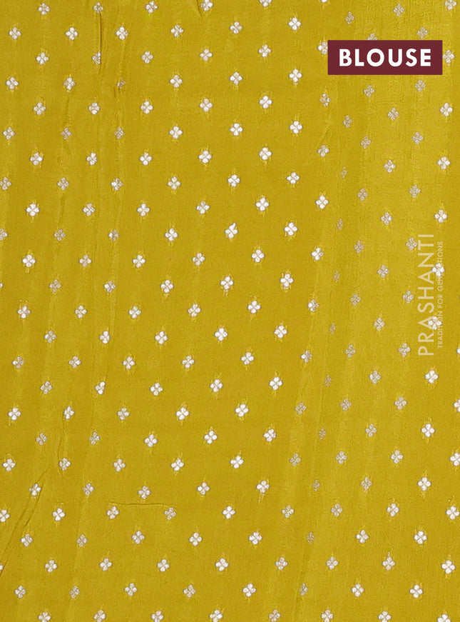 Semi mysore silk saree lime yellow with allover zari weaves and zari woven border