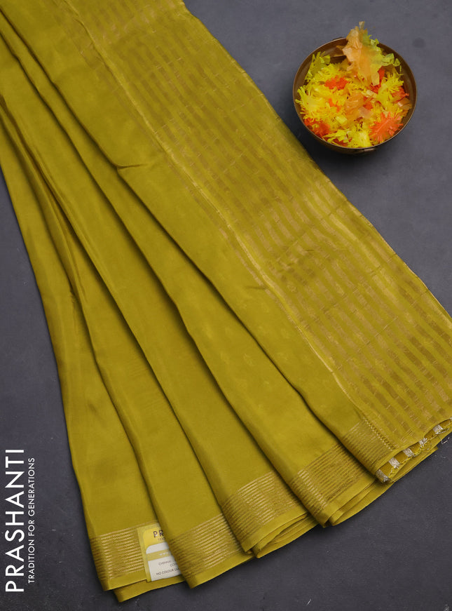 Semi mysore silk saree lime yellow with plain body and zari woven border