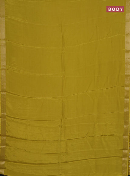 Semi mysore silk saree lime yellow with plain body and zari woven border