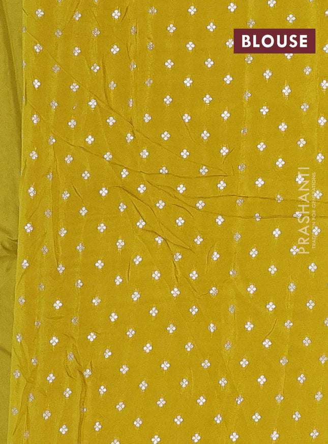 Semi mysore silk saree lime yellow with plain body and zari woven border
