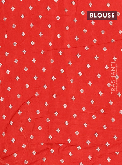 Semi mysore silk saree orange with allover zari checked pattern and temple design zari woven border