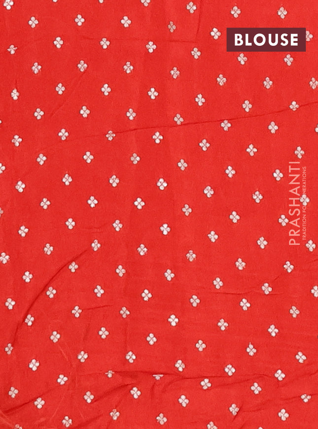 Semi mysore silk saree orange with allover zari checked pattern and temple design zari woven border