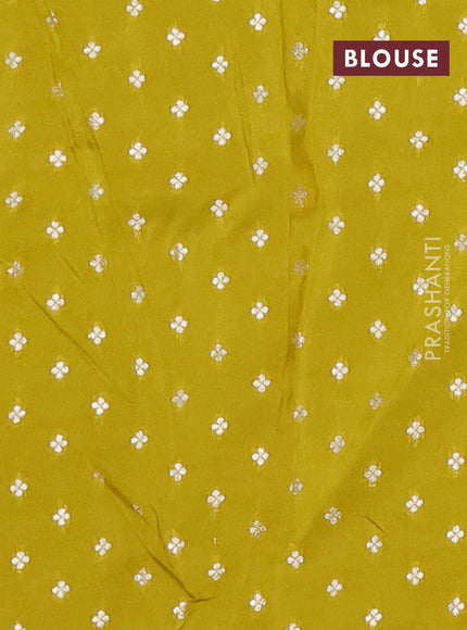 Semi mysore silk saree lime yellow with allover zari checked pattern and temple design zari woven border