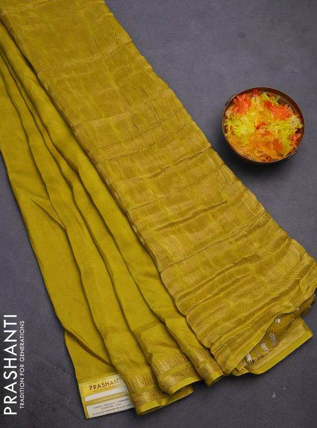Semi mysore silk saree lime yellow with plain body and temple design zari woven border