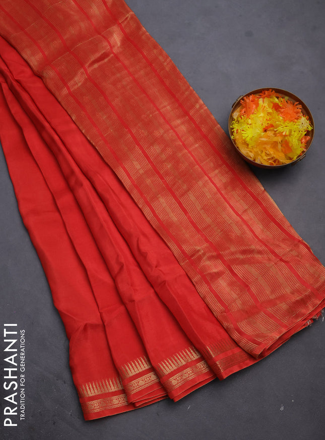 Semi mysore silk saree orange with plain body and temple design zari woven border