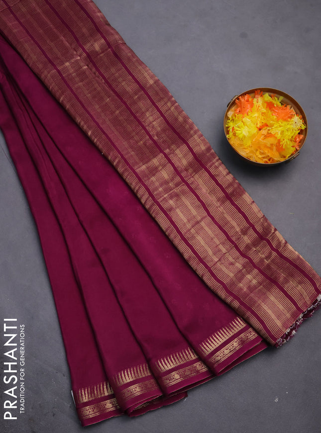 Semi mysore silk saree wine shade with plain body and temple design zari woven border