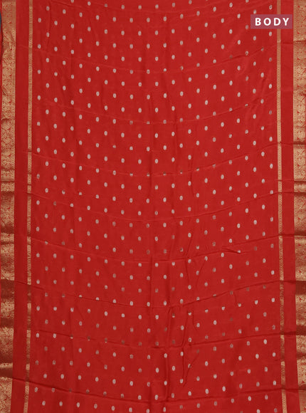 Semi mysore silk saree orange with zari woven buttas and rettapet zari woven border