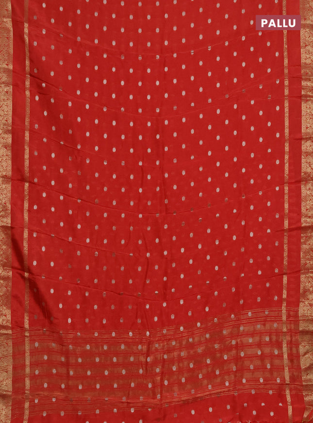 Semi mysore silk saree orange with zari woven buttas and rettapet zari woven border