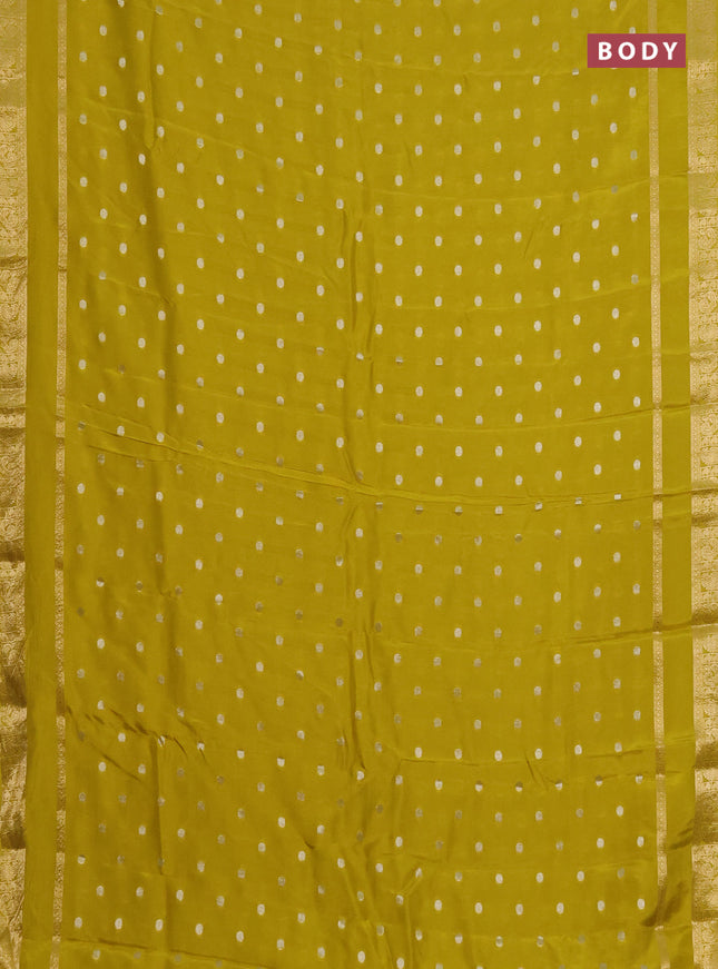 Semi mysore silk saree lime yellow with silver zari woven buttas and rettapet zari woven border