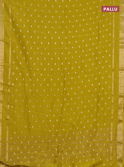 Semi mysore silk saree lime yellow with silver zari woven buttas and rettapet zari woven border