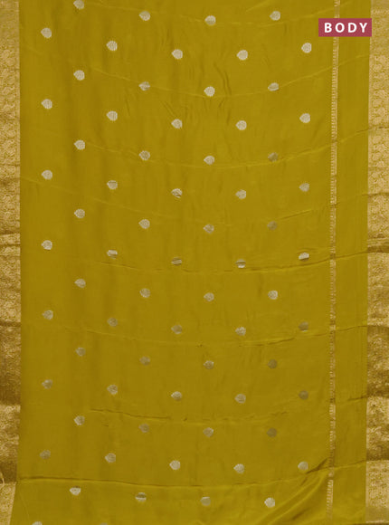 Semi mysore silk saree lime yellow with zari woven buttas and long rettapet zari woven border