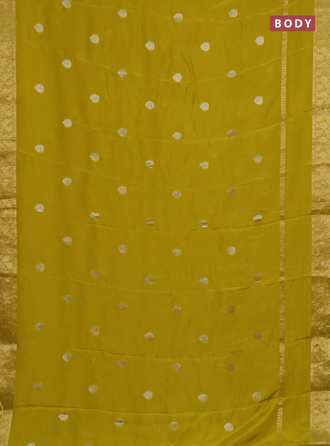Semi mysore silk saree lime yellow with zari woven buttas and long rettapet zari woven border
