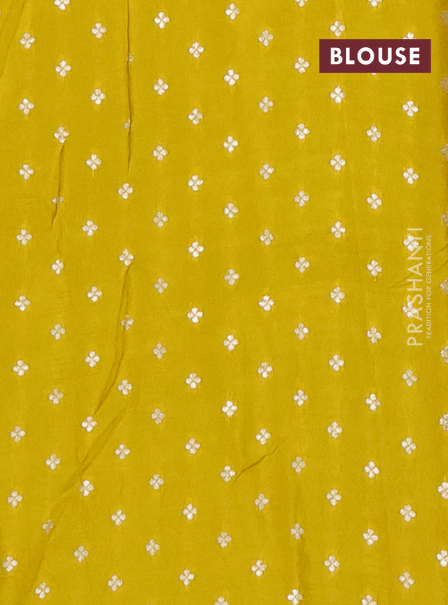 Semi mysore silk saree lime yellow with zari woven buttas and long rettapet zari woven border