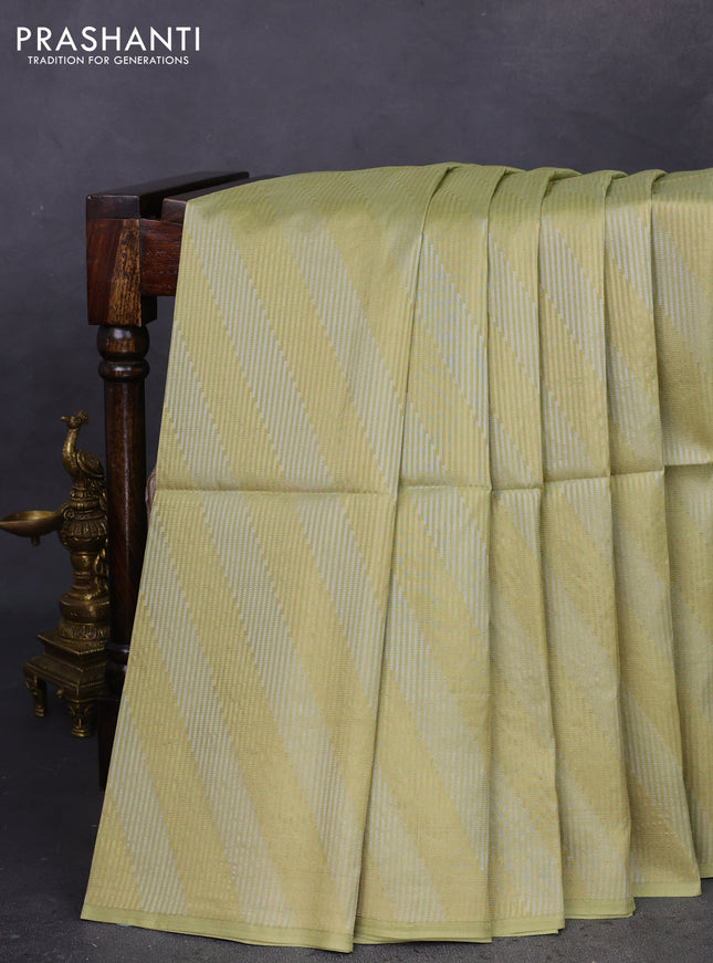 Kanchipuram soft silk saree pista green with silver & gold zari woven brocade weaves in borderless style