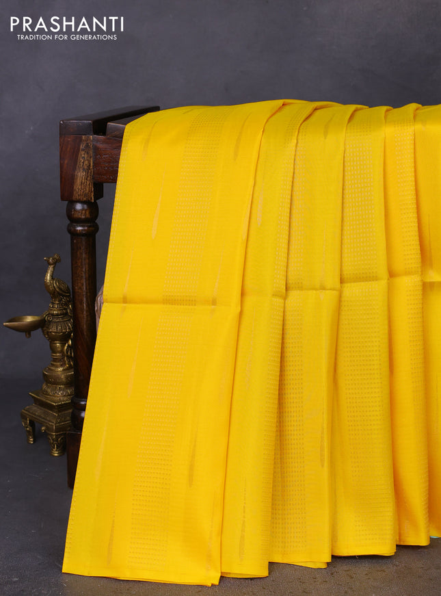 Kanchipuram soft silk saree yellow and purple with allover zari weaves in borderless style