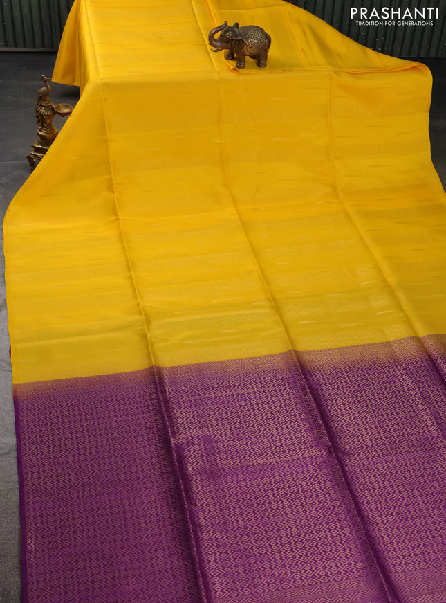 Kanchipuram soft silk saree yellow and purple with allover zari weaves in borderless style