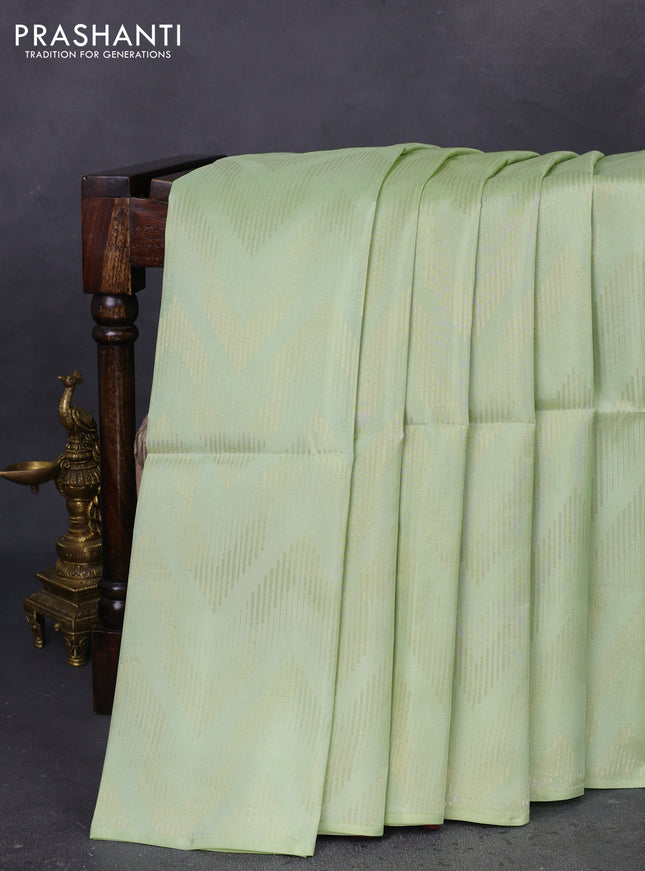 Kanchipuram soft silk saree pastel green and maroon with allover zig zag zari weaves in borderless style