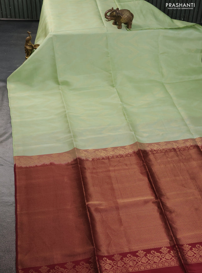 Kanchipuram soft silk saree pastel green and maroon with allover zig zag zari weaves in borderless style