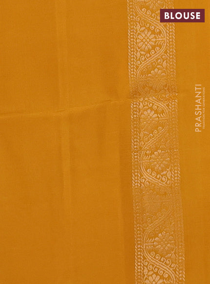 Kanchipuram soft silk saree mango yellow with zari woven buttas and floral zari woven butta border
