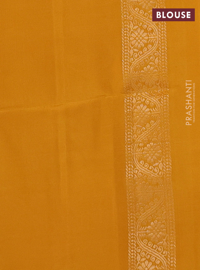 Kanchipuram soft silk saree mango yellow with zari woven buttas and floral zari woven butta border