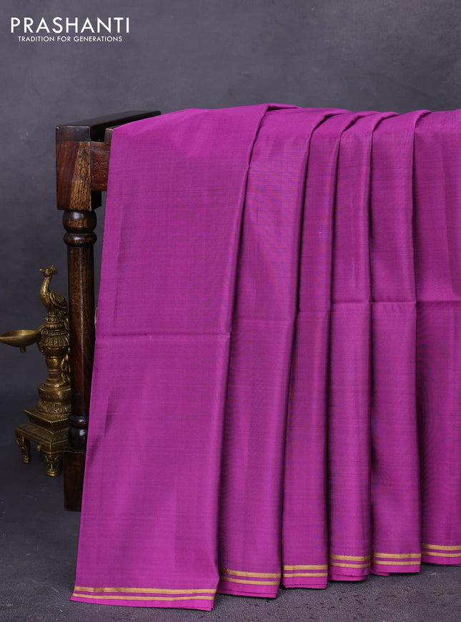 Kanchipuram soft silk saree purple and navy blue with plain body and zari woven simple border