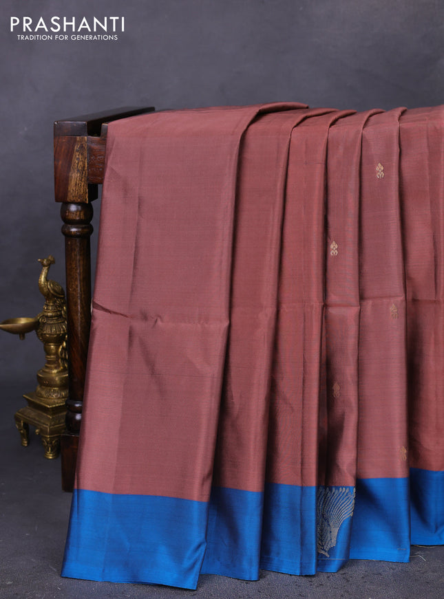 Kanchipuram soft silk saree pastel brown and cs blue with zari woven buttas and zari woven butta border
