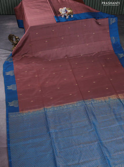 Kanchipuram soft silk saree pastel brown and cs blue with zari woven buttas and zari woven butta border