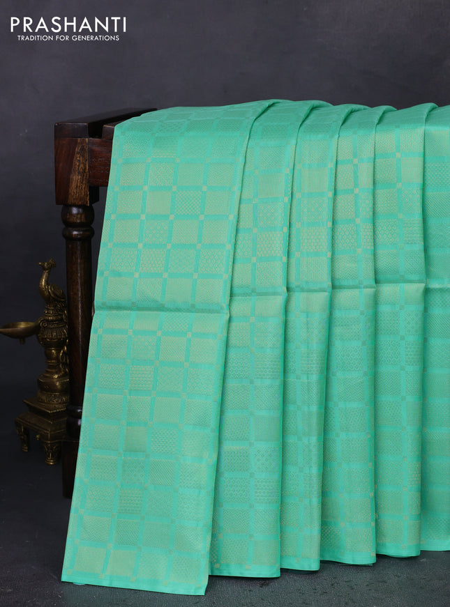 Kanchipuram soft silk saree teal green and green with allover zari woven brocade weaves in borderless style