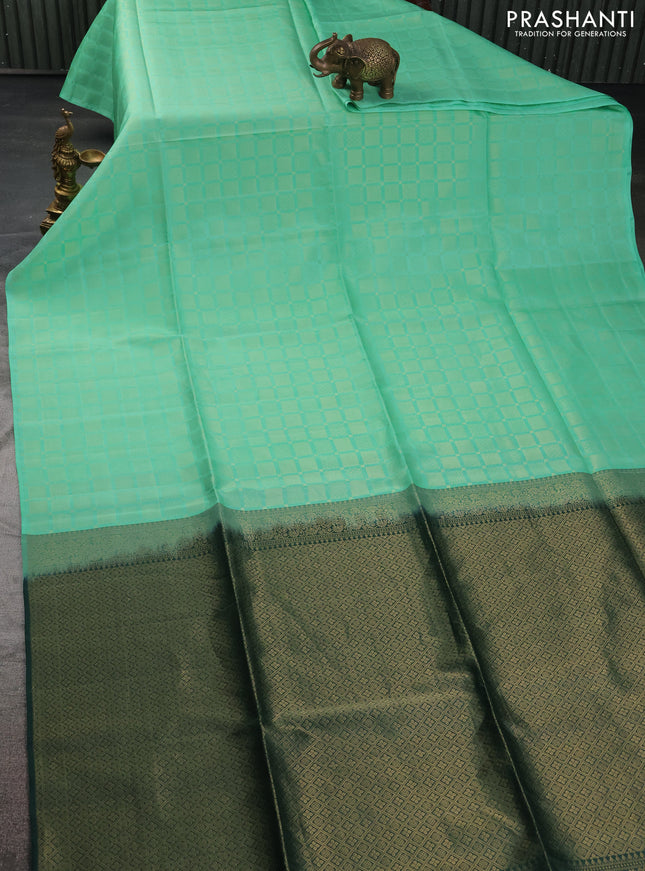 Kanchipuram soft silk saree teal green and green with allover zari woven brocade weaves in borderless style