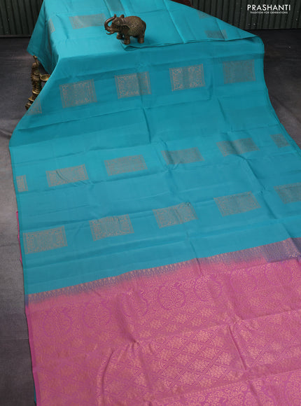 Kanchipuram silk saree teal blue and light pink with zari woven buttas in borderless style